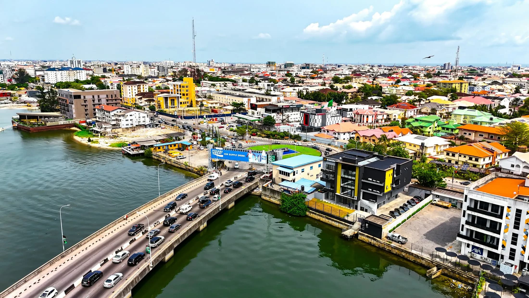 Aerial view of an African city with a waterway and bridge [seed]